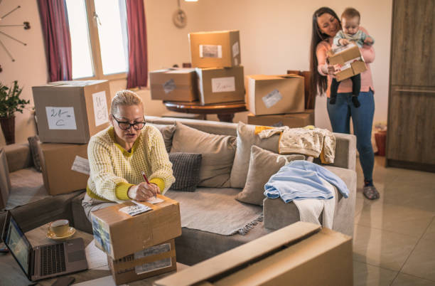 istock senior woman startup small business freelance with parcel box and computer 1294384079