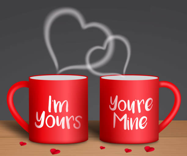 istock Valentine's vector background design. I'm yours and you're mine text in red coffee mug with red paper cut hearts art element for romantic valentine's day lovers celebration design. 1294384158