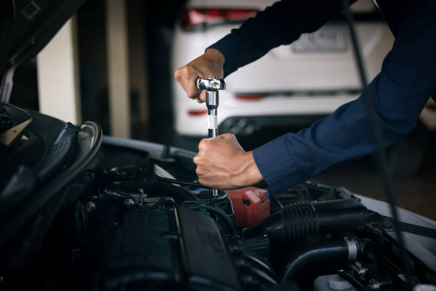 istock Car service, repair, maintenance concept. 1294385289