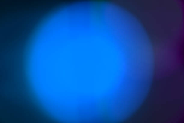 Blue gradient a circle or glitter light on a dark background. Abstract blurred background.