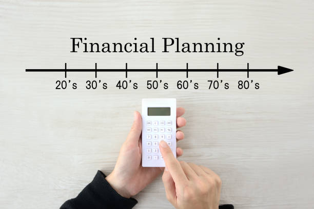 istock Human's hands calculating money for financial planning 1294390585