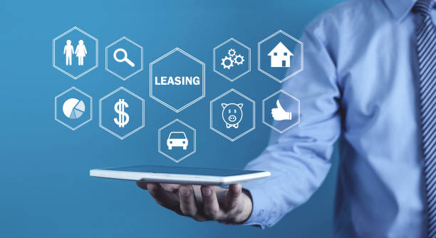 istock Man holding tablet computer. Leasing. Business concept 1294392239