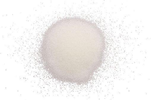 Heap of sugar on white background
