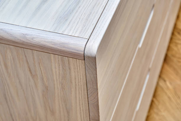 istock Stylish chest of drawers with bleached solid oak in room 1294397750
