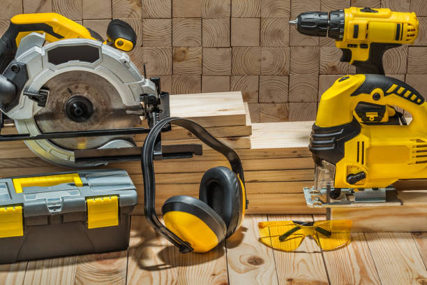 construction carpentry electric hand tools on wooden background construction carpentry electric hand tools on wooden background power tool photos stock pictures, royalty-free photos & images