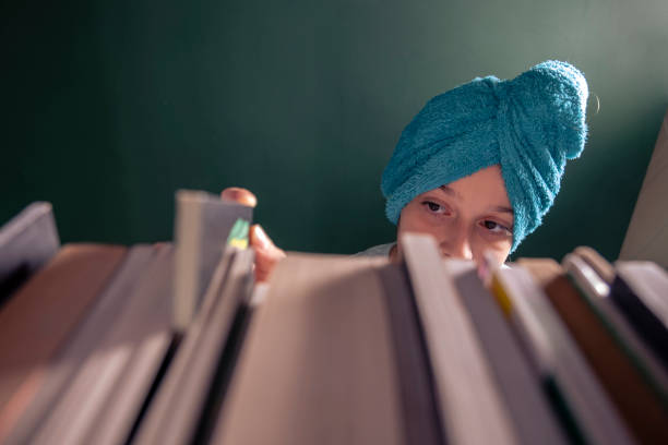 Little girl selects book