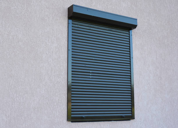 istock A close-up on house window with outdoor pvc roller blinds, motorized window roller shutters. 1294398591