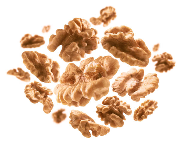 istock Peeled from the shell, walnut kernels levitate on a white background 1294401259