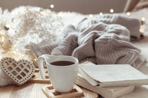istock White cup with drink on blurred background home decor. 1294405753