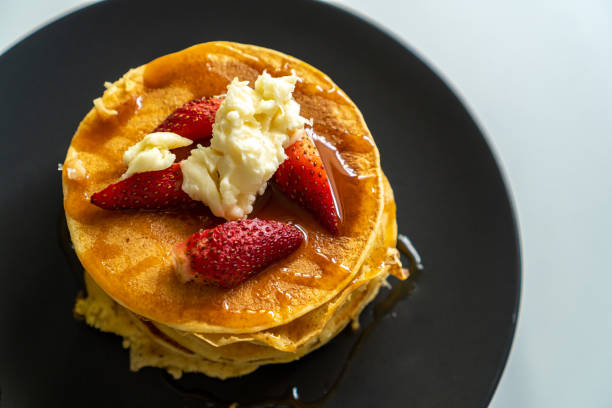 Pancake with honey and strawberry