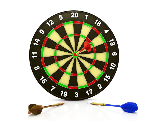 Closeup view of a dart player on a black background concentrating on the dartboard