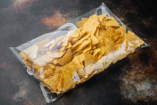 istock Packed and seasoned nachos and snack, on old dark rustic background 1294408274