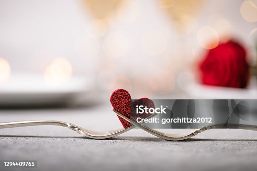 istock Forks and a heart. Holiday menu for Valentines Day. 1294409765