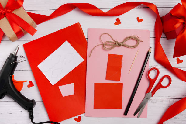 istock Valentines diy. Step by step instruction for handmade valentine greeting card with parachute from hearts. Craft gift, flat lay. step 1 1294413609