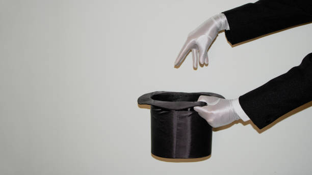 istock Portrait of young black Illusionist magician doing magic with a top hat 1294413949