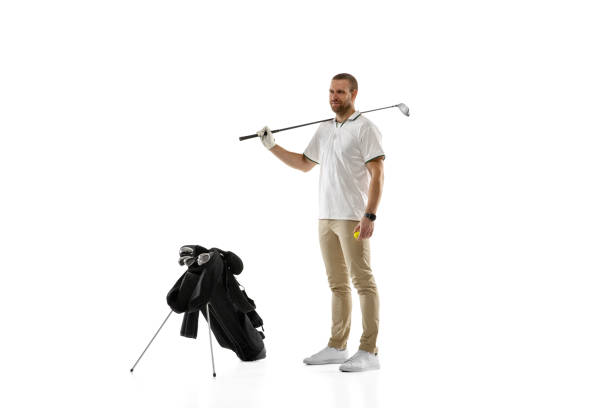 istock Golf player in a white shirt practicing, playing isolated on white studio background 1294414888