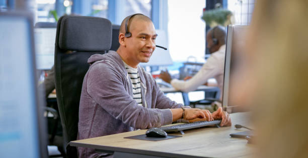 istock Mature man working in call centre 1294415248