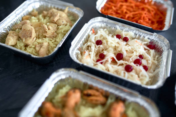 istock Different foil containers with delicious food. 1294416279