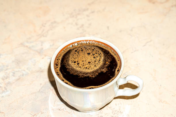 istock A cup of coffee on the table 1294417183