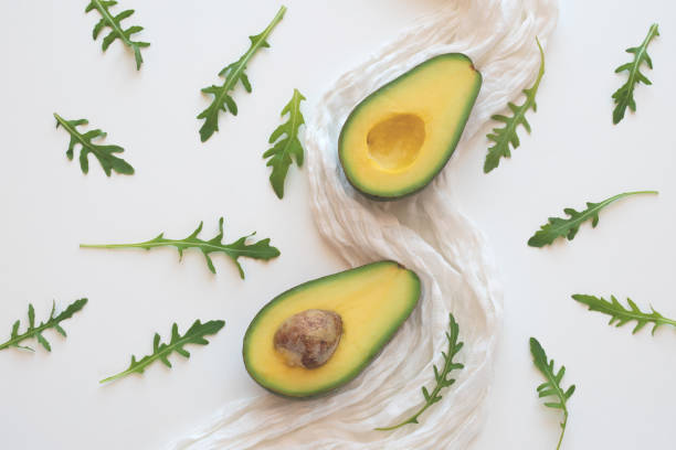 istock Two slices of avocado on a white napkin 1294419492