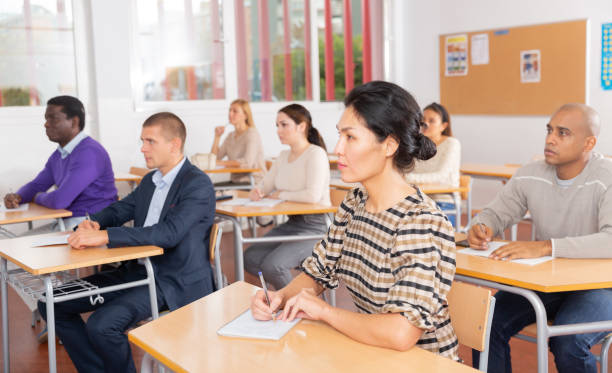 istock Young woman working during group business training 1294422650