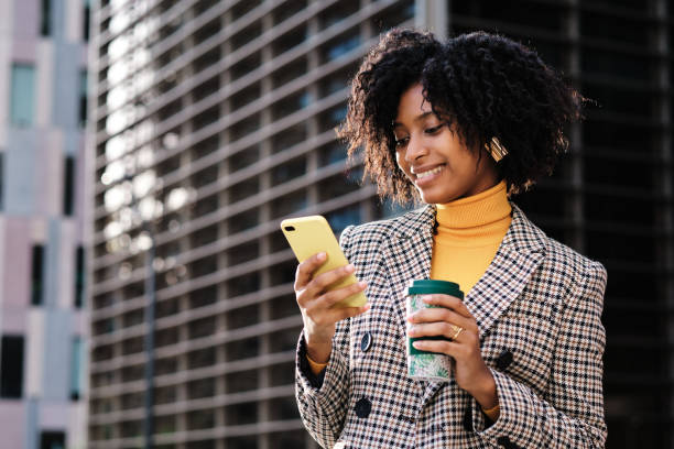 istock Business woman using her mobile phone. 1294424991
