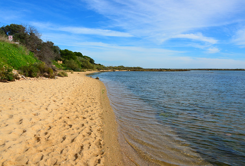 Cabanas de Tavira, Faro district / Algarve, Portugal: beach on the Ria Formosa lagoon - Ria Formosa natural reserve - Tavira Island in the background.