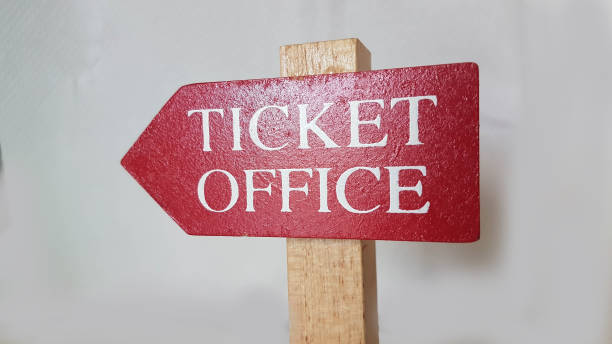 istock ticket office red arrow sing showing the direction isolated 1294431483