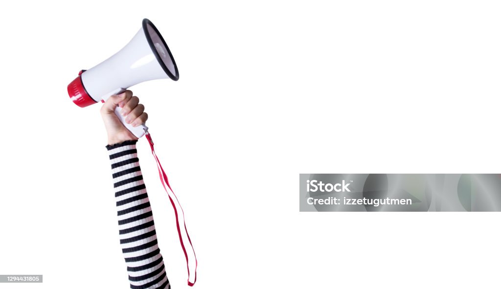 young woman holding megaphone Public Speaker Stock Photo