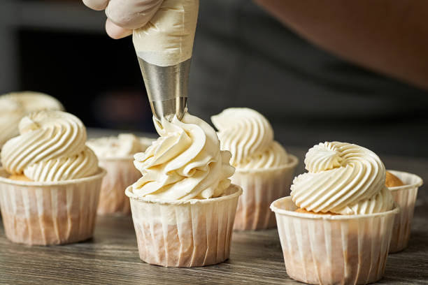 istock Closeup of a pastry chef making a cream 1294432705