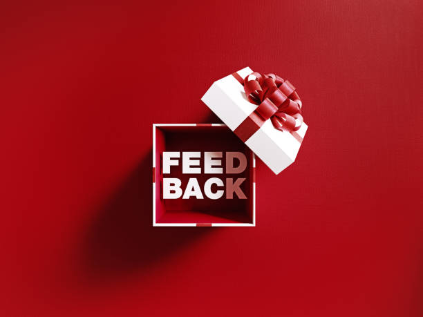 Feedback Text Coming Out Of A White Gift Box Tied With Red Ribbon