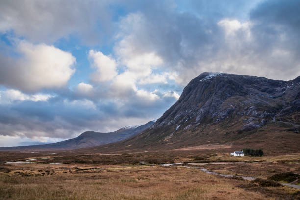 istock Majestic landscape image view down Glencoe Valley in Scottish Highlands with mountain ranges in dramatic Winter lighting 1294434738