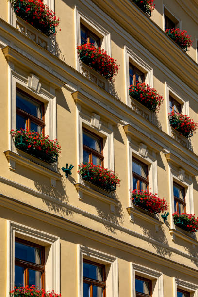 Karlovy Vary, Czech Republic Aug 24, 2019:  Flowers in the window - in the old town  of Karlovy Vary.
