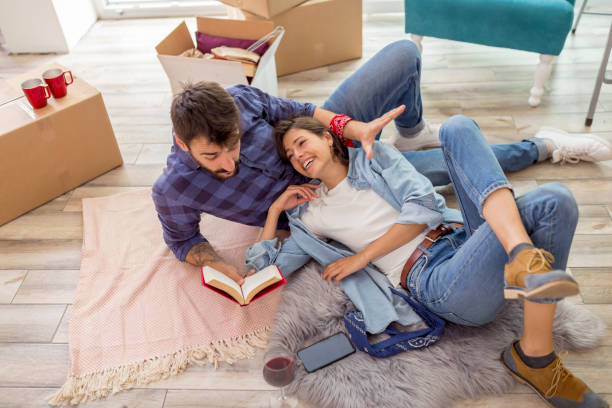 istock Couple taking a break while moving in new home 1294436414