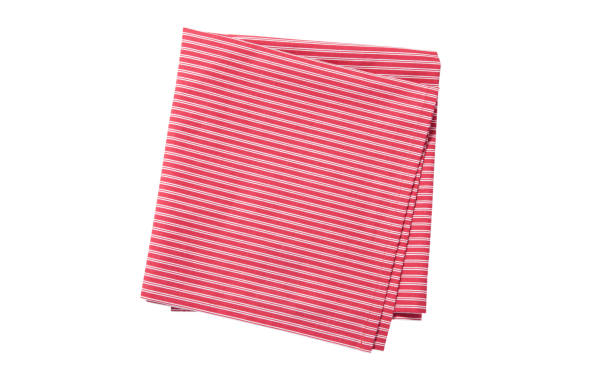 istock Red napkin top view isolated. Stack of dish towels on white 1294438560