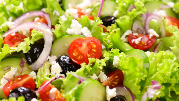 istock vegetable salad with tomato, olive, onion and cheese 1294438787