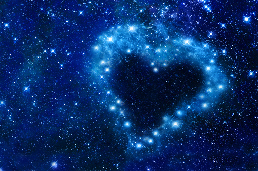 Bright stars in a night sky arranged in the shape of a heart, romantic magic night, love  and Valentines day card