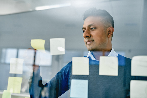 Shot of a businessman having a brainstorming session in a modern office