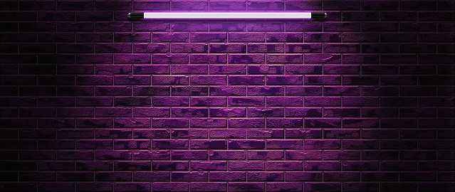 Glowing purple, blue, neon lamps on a background of a brick wall indoors 3D Rendering