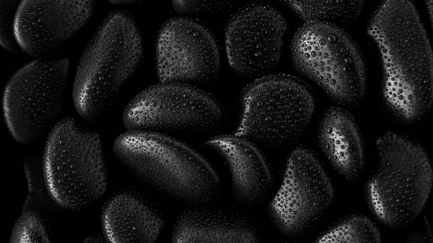 istock Black Stones.rock background and water drop 1294446599