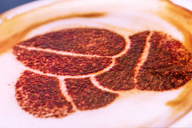Cup of cappuccino close-up with coffee bean picture
