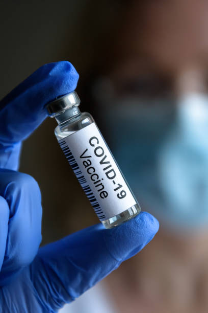 istock COVID-19 vaccine in doctor’s hand close-up 1294461527