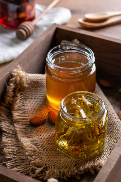istock Two small jars of honey 1294465196