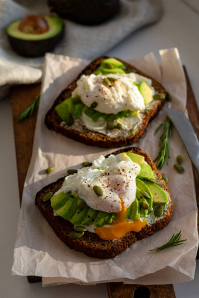 istock Two sandwiches with avocado and egg for breakfast 1294465243