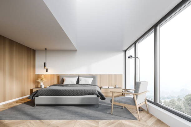 istock Panoramic white and wooden master bedroom interior 1294466819