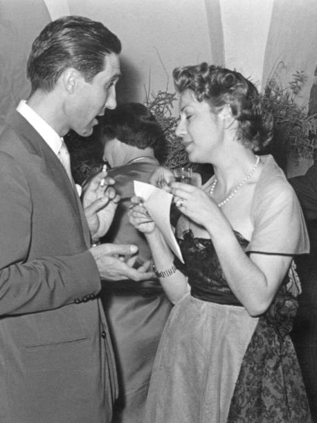 happy people at a party in 1950. - high society men tuxedo party imagens e fotografias de stock