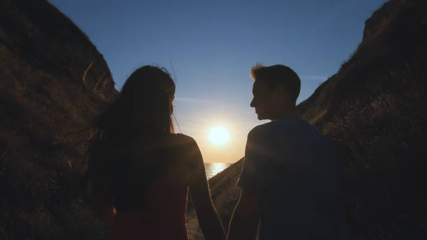 istock The romantic couple walking in the mountains 1294468900