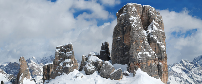 The beautiful group of the five towers (Cinque Torri) in the Sexten Dolomites in winter. The Cinque Torri is a small mountain complex that is part of the Nuvolau group, near Cortina d'Ampezzo. Italy