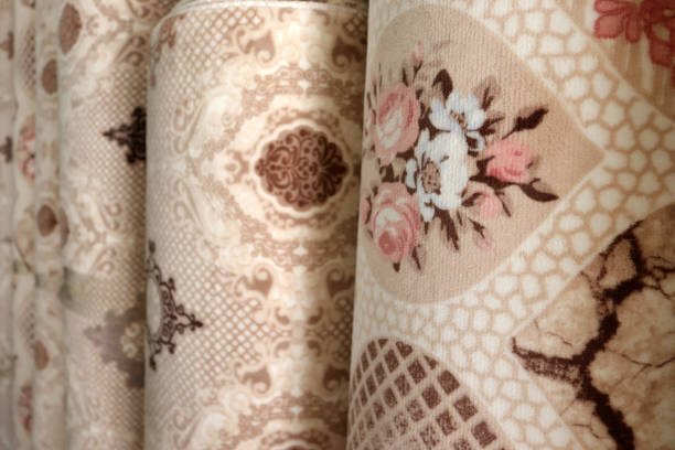 istock Various rugs in the carpet shop. Home decoration. 1294470145