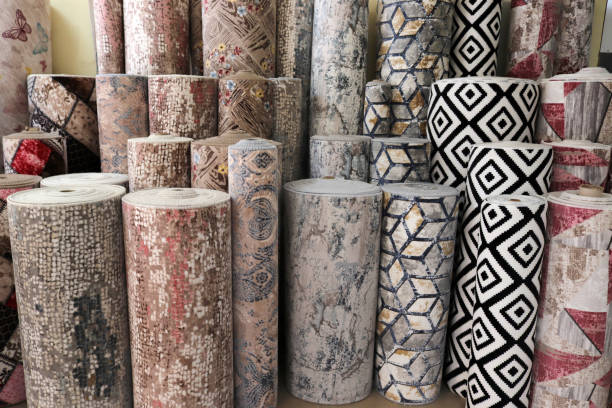istock Various rugs in the carpet shop. Home decoration. 1294470339